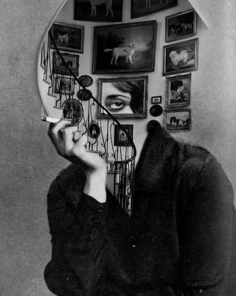 Black-and-white collage: a woman smoking, her head replaced by a round wall of small framed paintings.