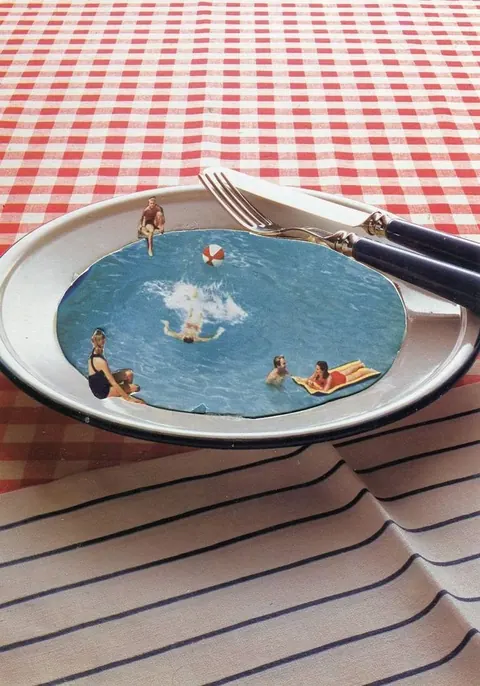 Photo collage: vintage swimmers splashing in a pool set inside a dinner plate on a red gingham tablecloth.