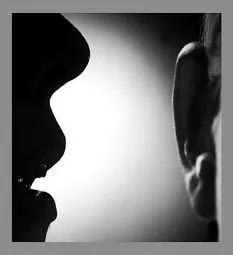 High-contrast black-and-white profile silhouette of a face against white light.